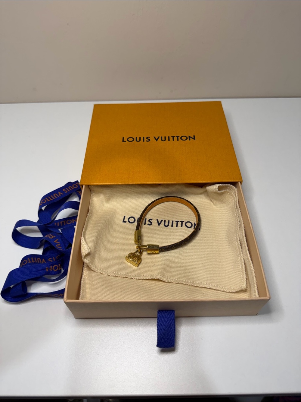 Louis Vuitton Brown Monogram Bracelet with Gold Charm Accent